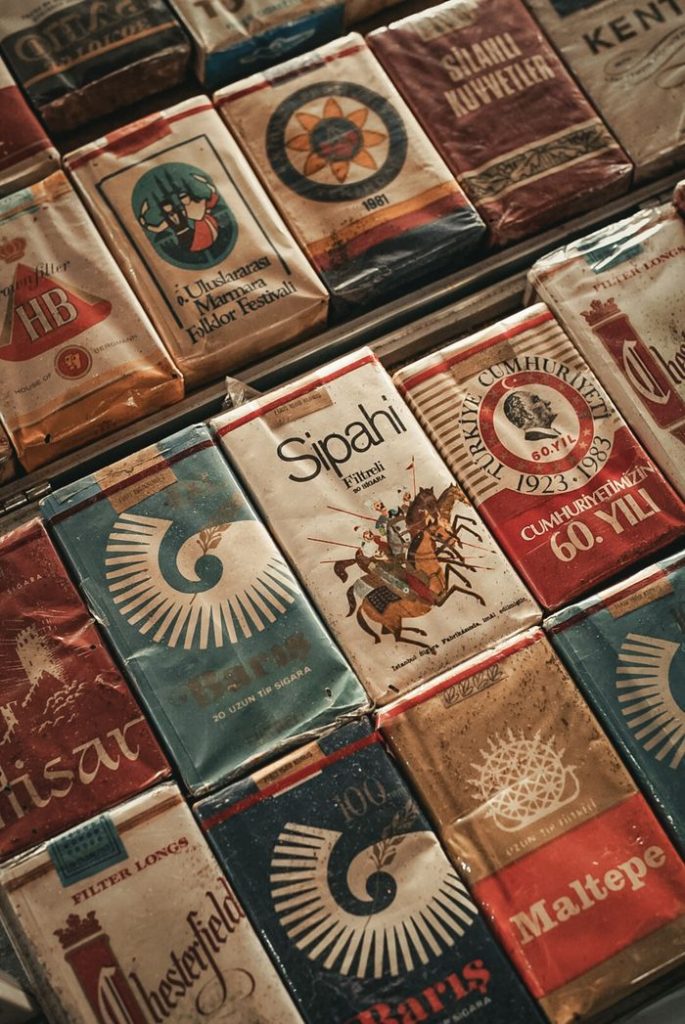 Retro collection of vintage cigarette packs showcasing historic design and branding.